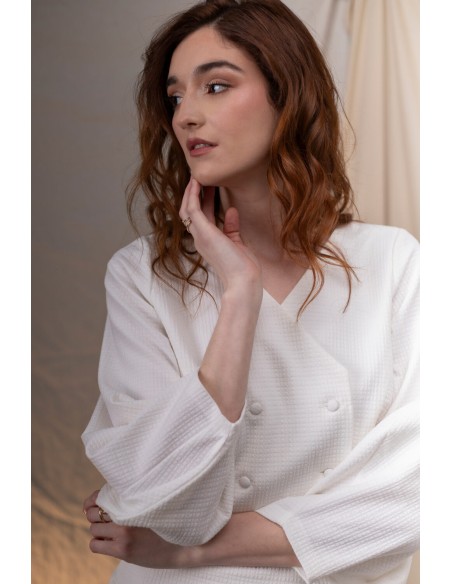 Short double-breasted jacket with buttons and wide sleeves