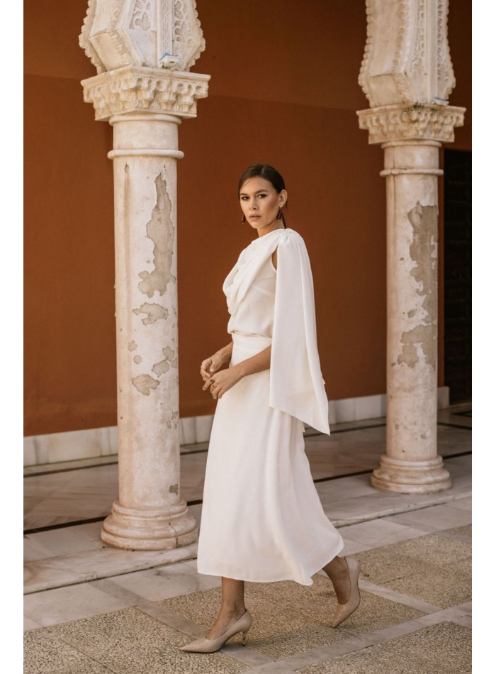 Draped party blouse with cape sleeves