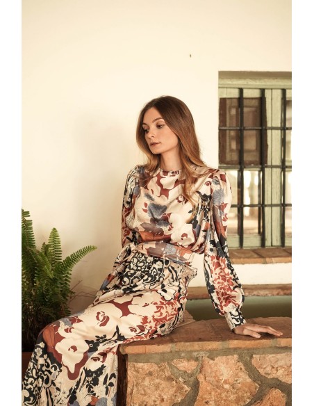 Top estampado tipo blusa con bajo asimétrico y lazada para ocasiones especiales