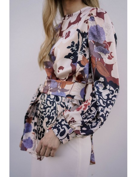 Printed blouse-type top with asymmetrical hem and lacing