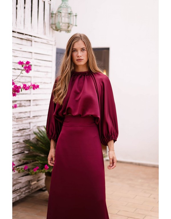 Long sleeve burgundy top with gathered at the waist