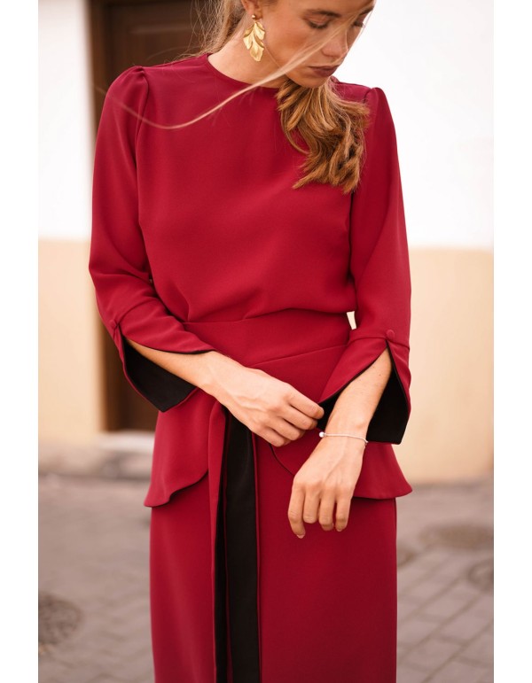 Dark red top with black cuffs and button 2