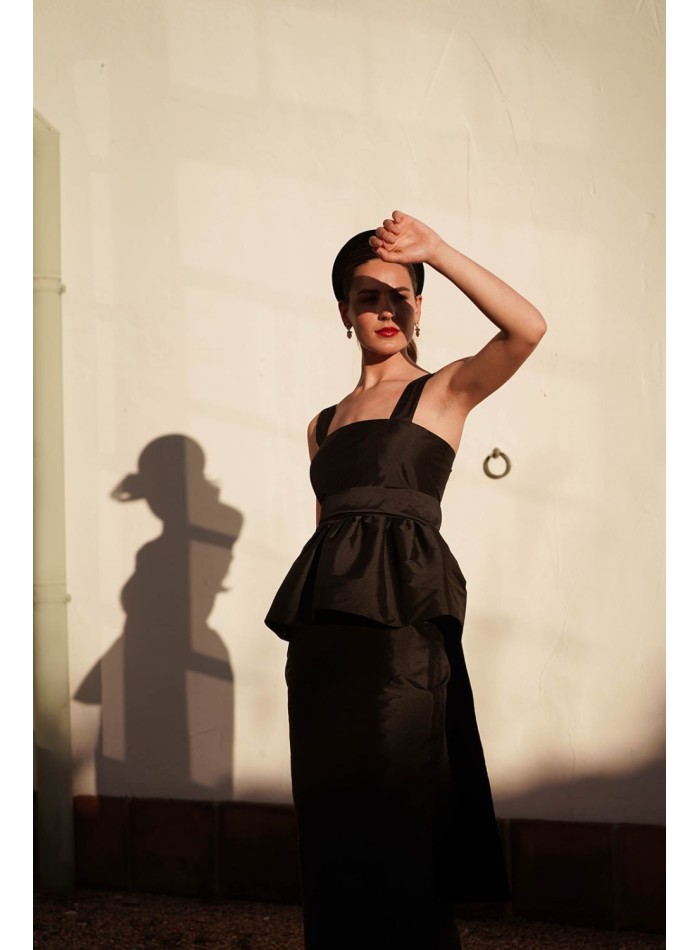 Black taffeta strapless top with peplum ruffle...