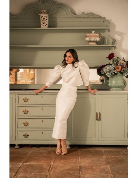 Falda midi brocada en color crudo