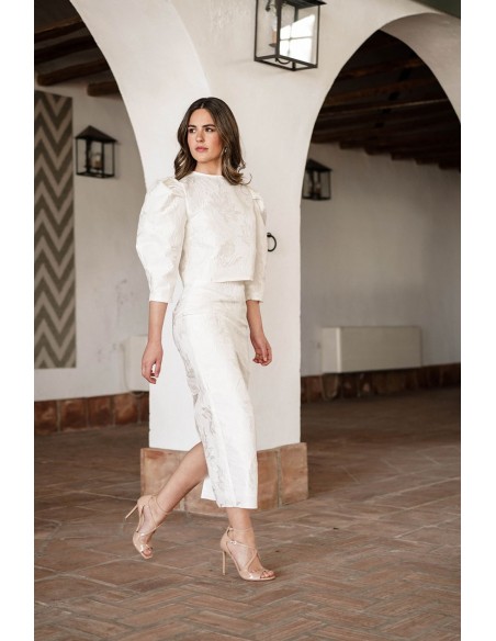 Falda midi brocada en color crudo