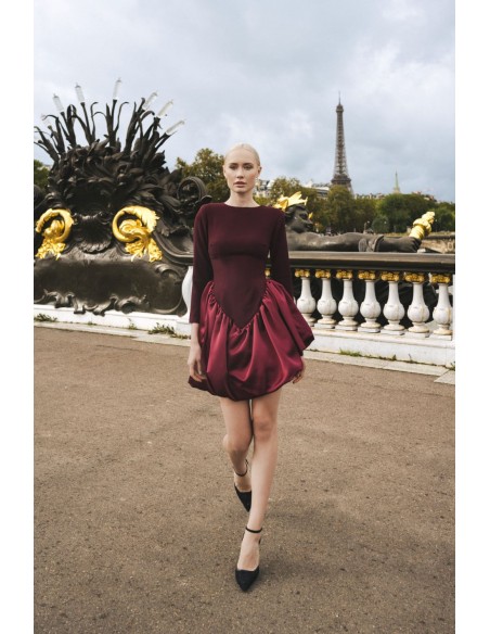 Short burgundy dress with matte body and glossy peplum