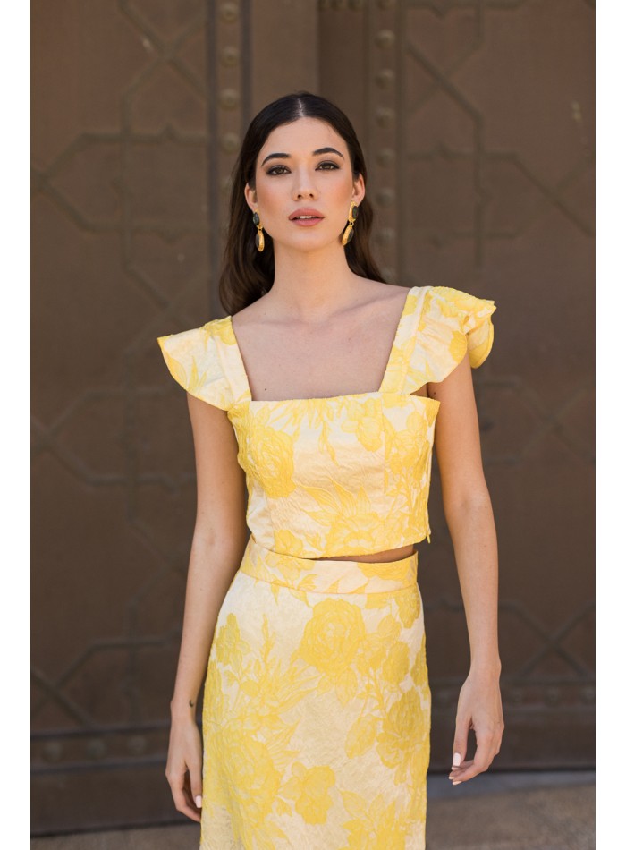 Yellow printed party top with ruffled shoulder...