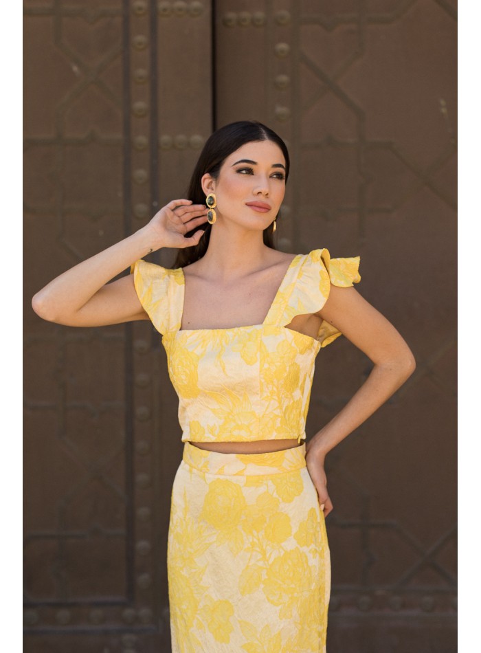 Yellow printed party top with ruffled shoulder...