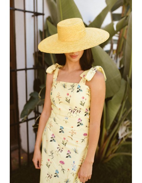 Top amarillo con estampado floral y lazadas para ocasiones especiales