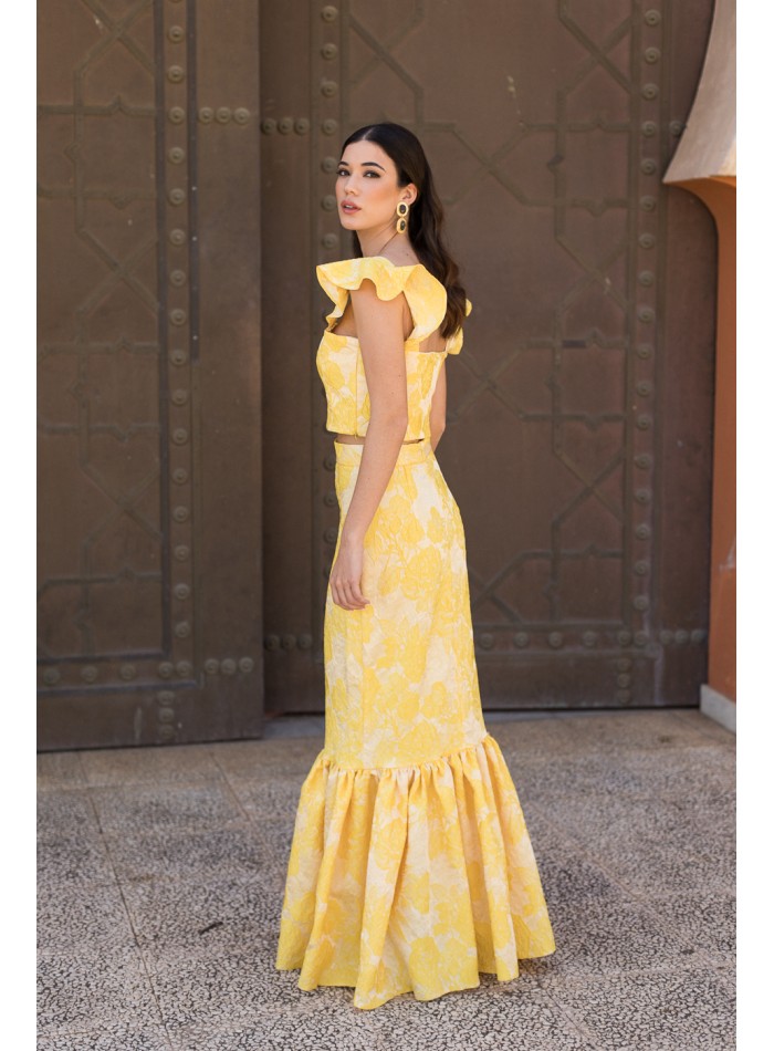 Jupe longue imprimée jaune avec maxi volant