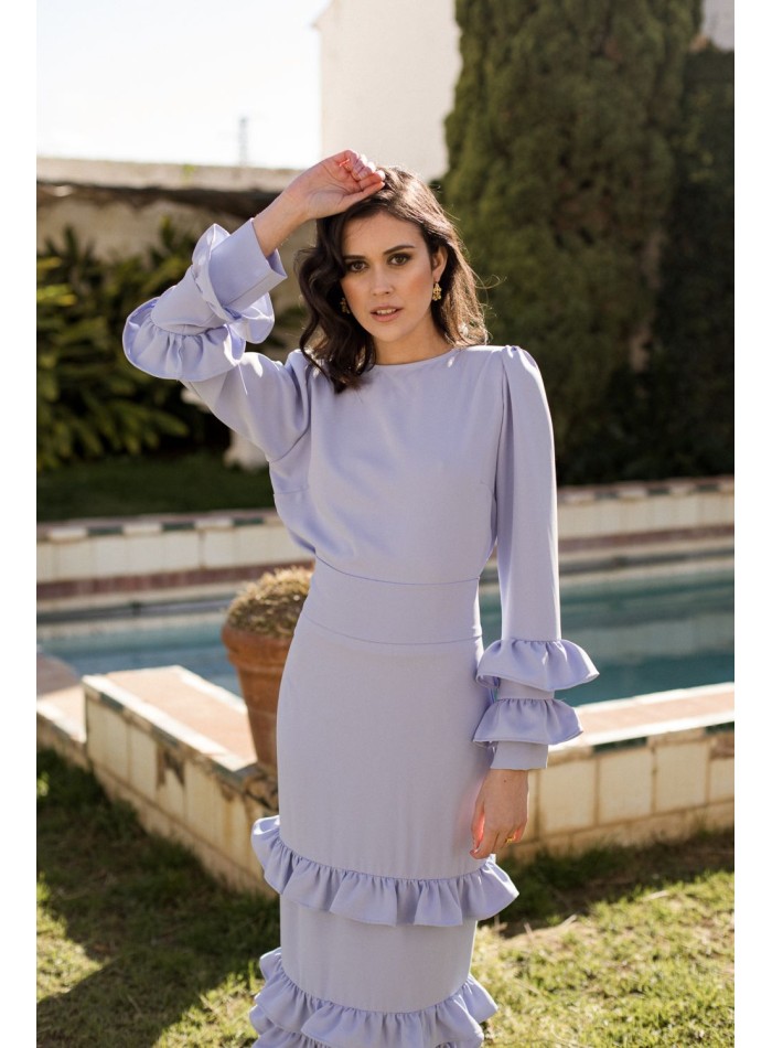 Blusa de fiesta azul claro con mangas largas y volantes para eventos