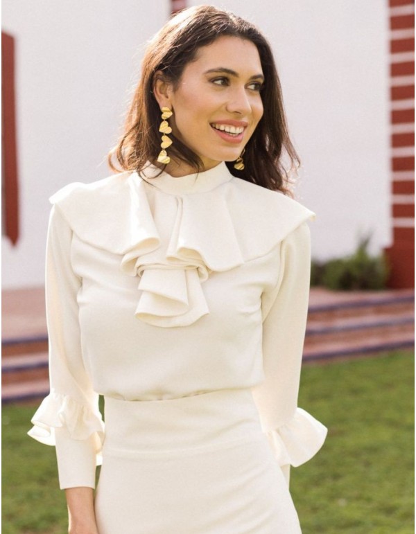 Ecru blouse with ruffled collar and long sleeves