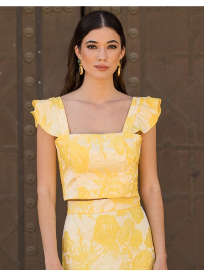 Yellow printed party top with ruffled shoulder...