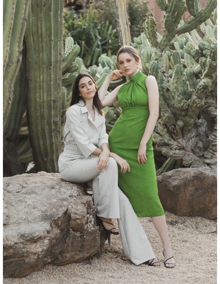 Pantalón acampanado con estampado de lunares