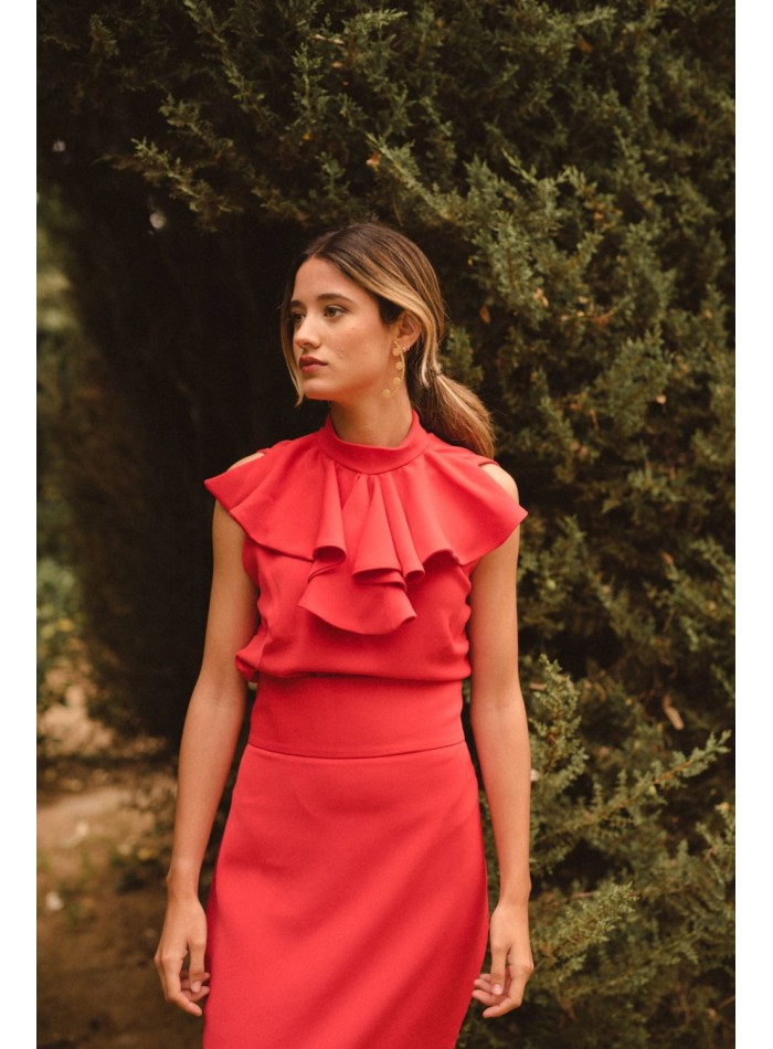 Red sleeveless top with ruffled collar