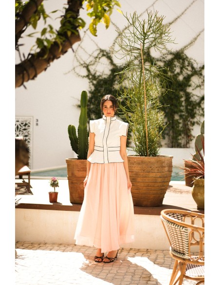 Ecru vest with black piping