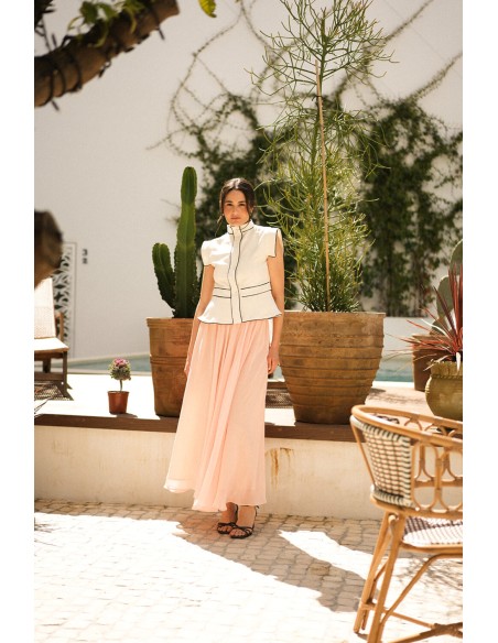 Ecru vest with black piping