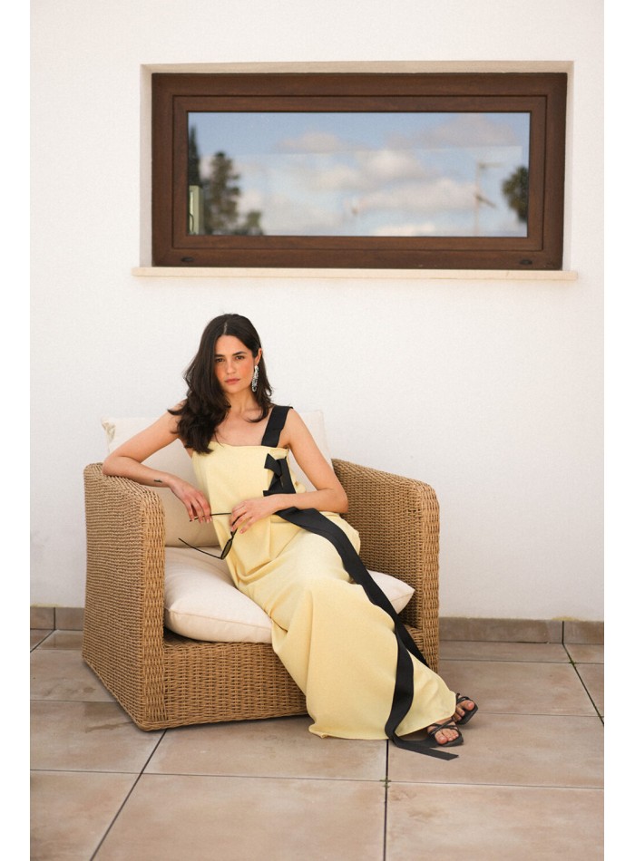 Long yellow dress with black bows