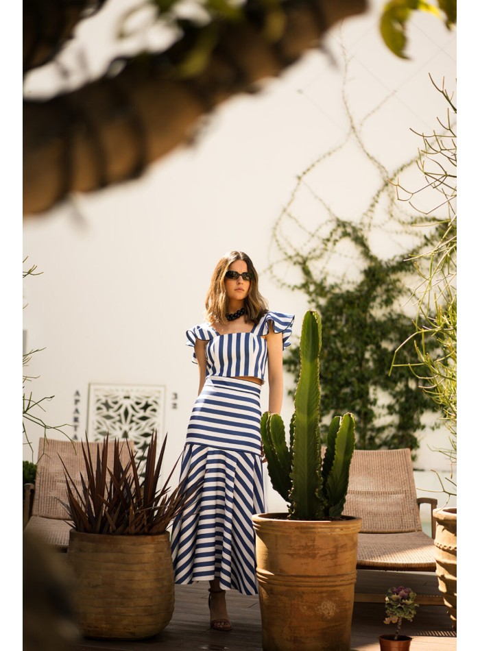 Falda midi de rayas con volante