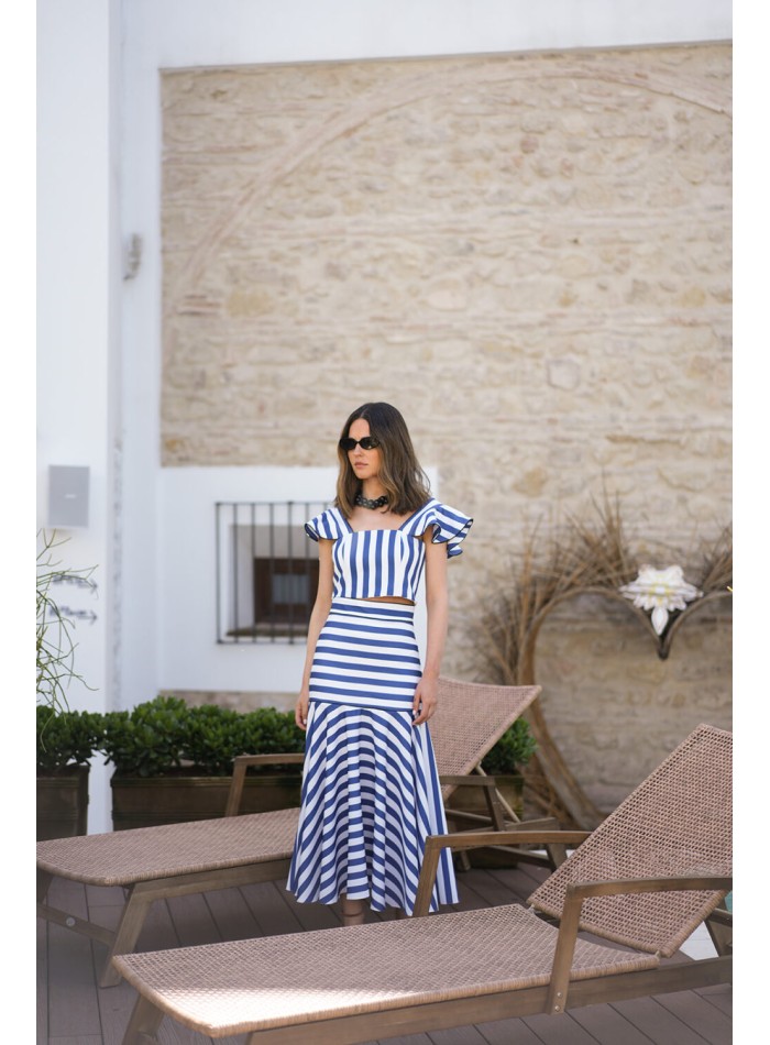 Falda midi de rayas con volante