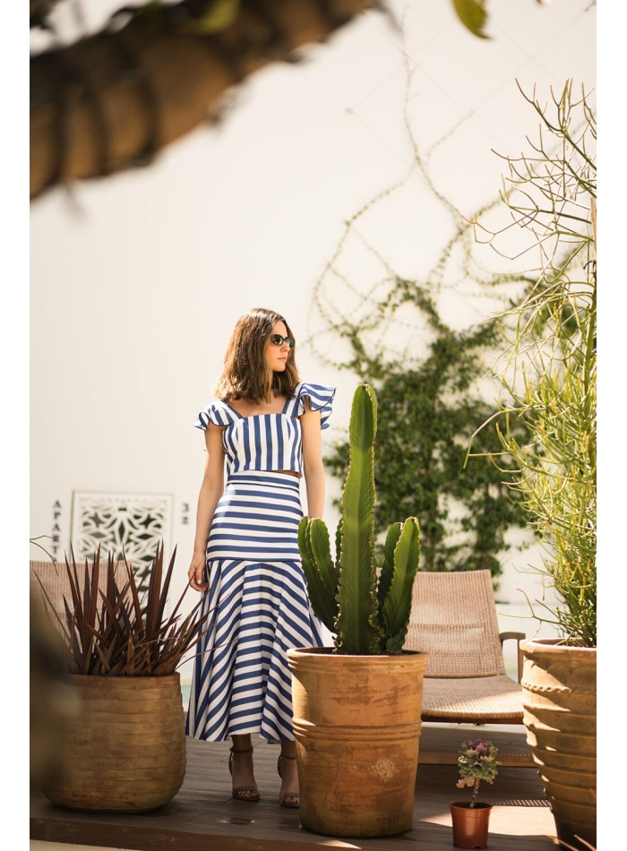 Falda midi de rayas con volante