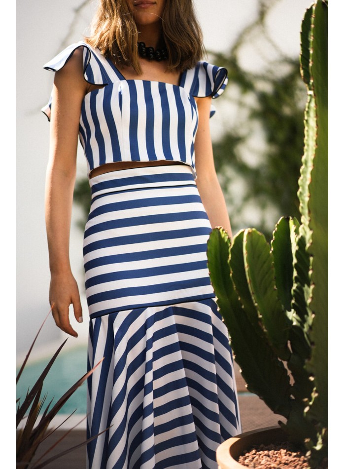 Falda midi de rayas con volante