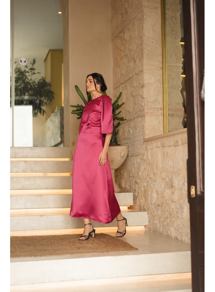 Jupe midi évasée fuchsia avec fermeture éclair...