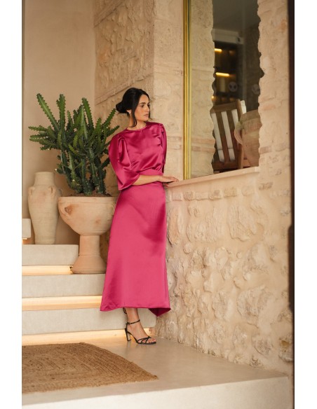 Falda midi evasé fucsia con cremallera invisible para invitada de boda