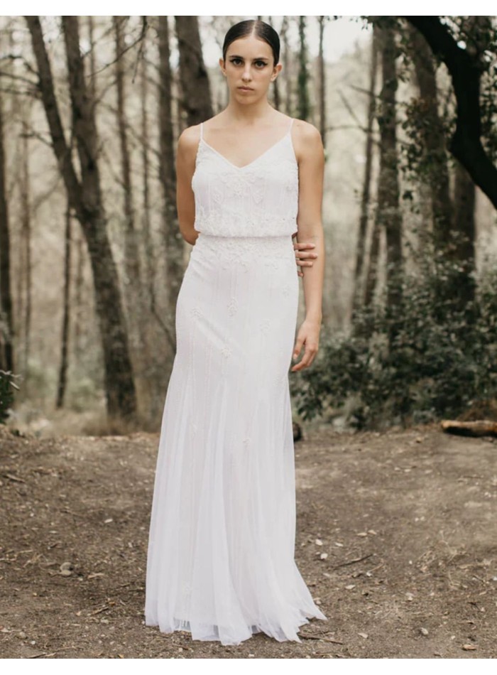 Long wedding dress with rhinestones and thin...