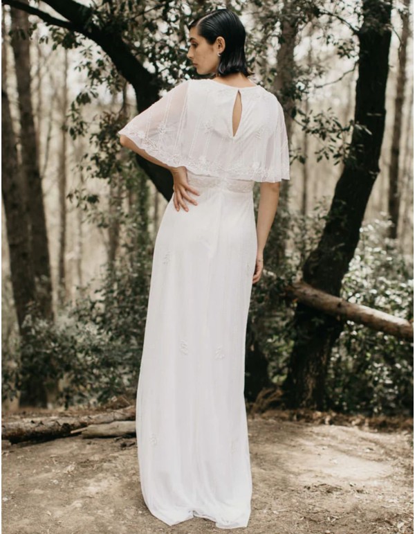 Vestido largo blanco con manga corta fluida 2