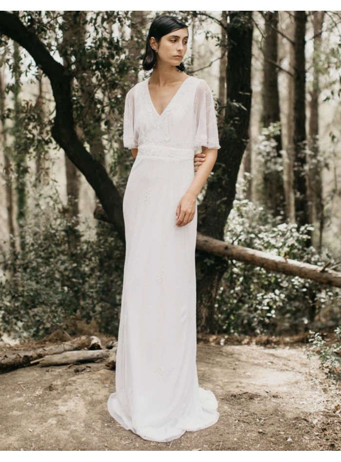 Long white dress with short flowing sleeves