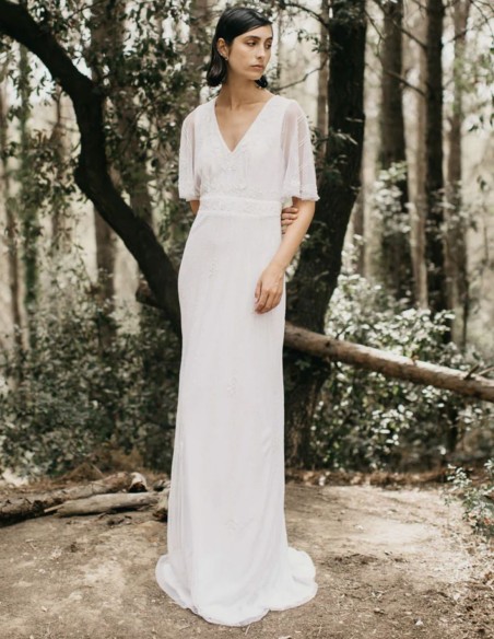 Vestido largo blanco con manga corta fluida