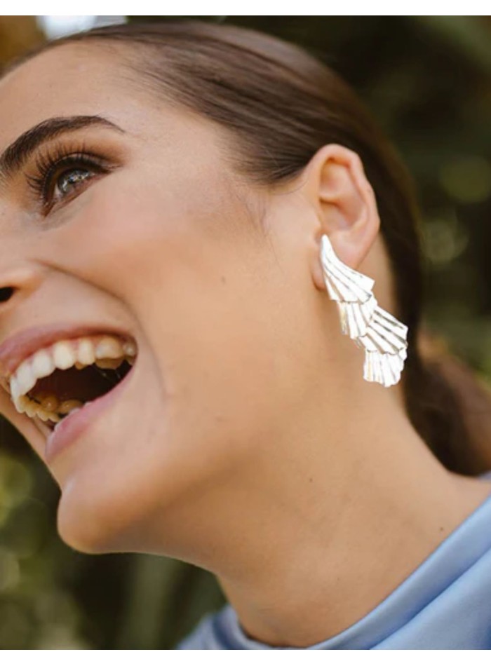 Pendientes de fiesta plateados superpuestos