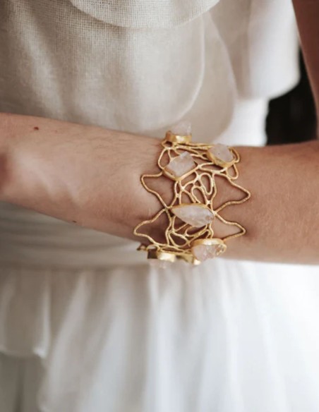 Golden bracelet with colored stones