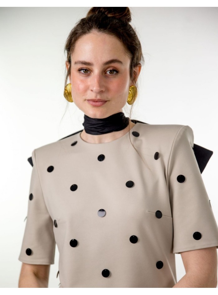 Grey mini dress with studs and maxi shoulder pads