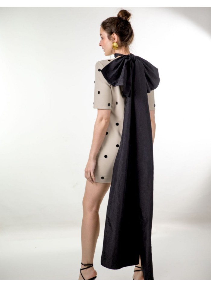 Grey mini dress with studs and maxi shoulder pads