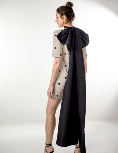 Grey mini dress with studs and maxi shoulder pads