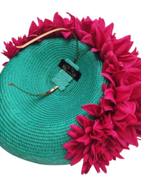 Turquoise guest headdress with fuchsia petals