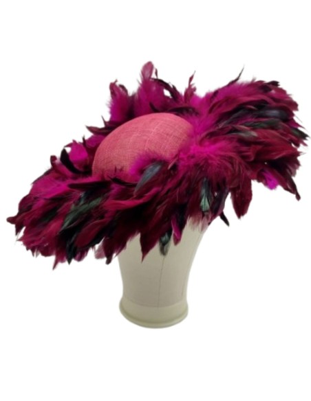 Pamela covered with pheasant feathers in bougainvillea color