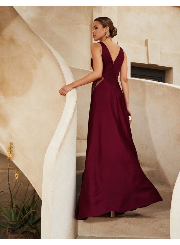 Long satin guest dress with V-neckline and lace