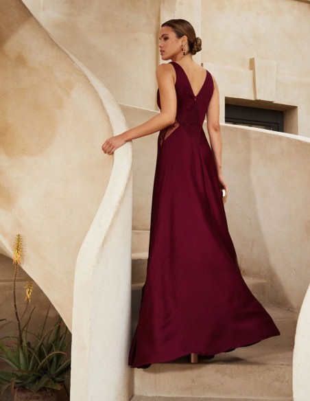 Long satin guest dress with V-neckline and lace