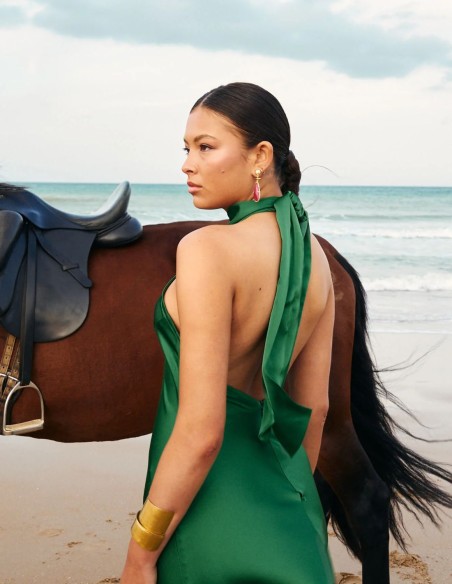 Long satin party dress with halter neckline and open back