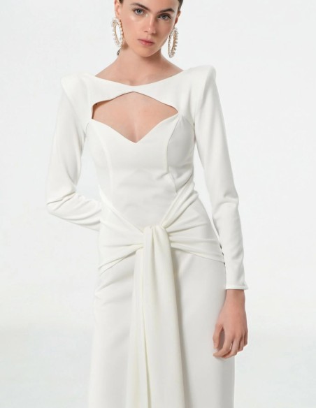 Long white wedding dress with long sleeves and cut-out neckline