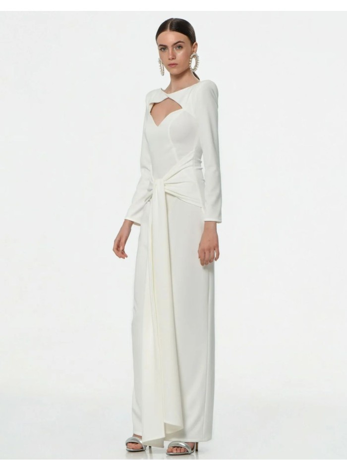 Long white wedding dress with long sleeves and...