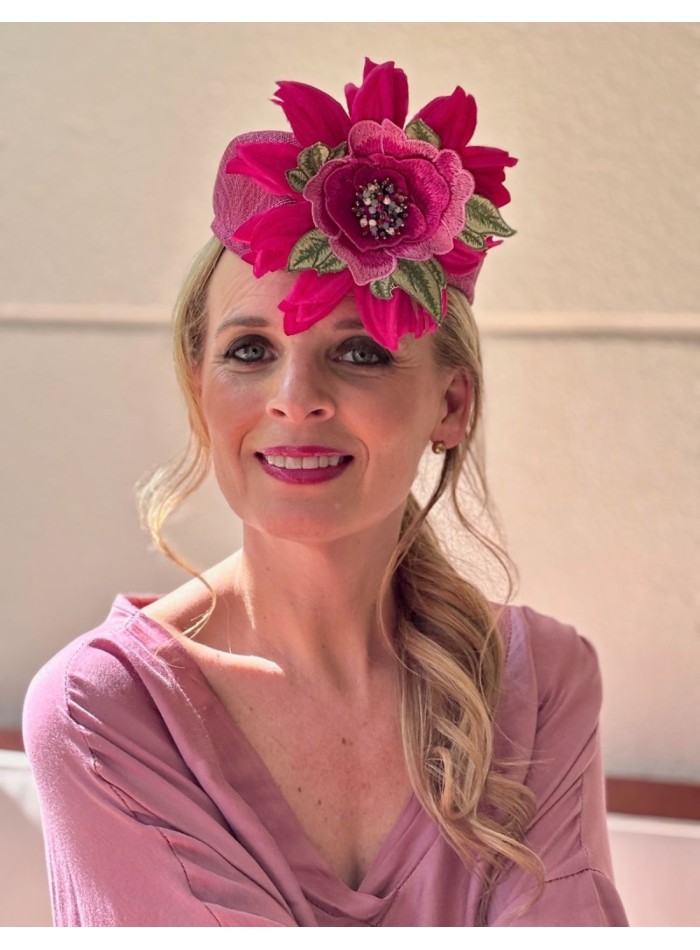 Fuchsia sinamay guest headpiece with flowers
