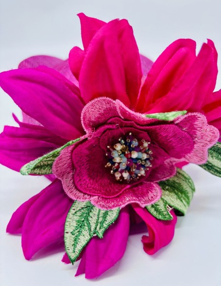 Fuchsia sinamay guest headpiece with flowers