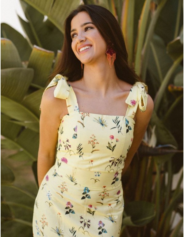 Top amarillo con estampado floral y lazadas para eventos