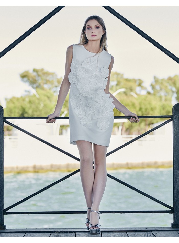 Short plain dress with flower detail