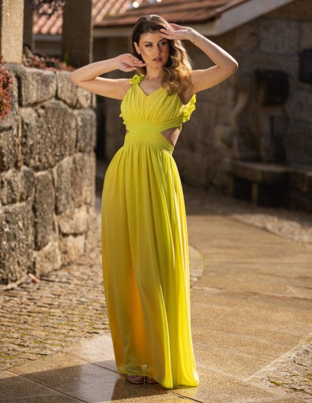 Long yellow party dress with flower details