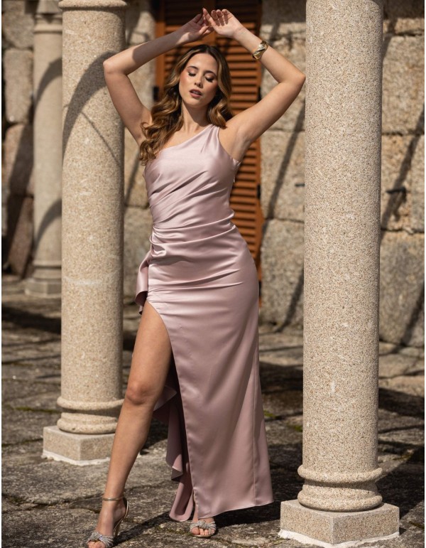 Long pink party dress with asymmetrical neckline and ruffles